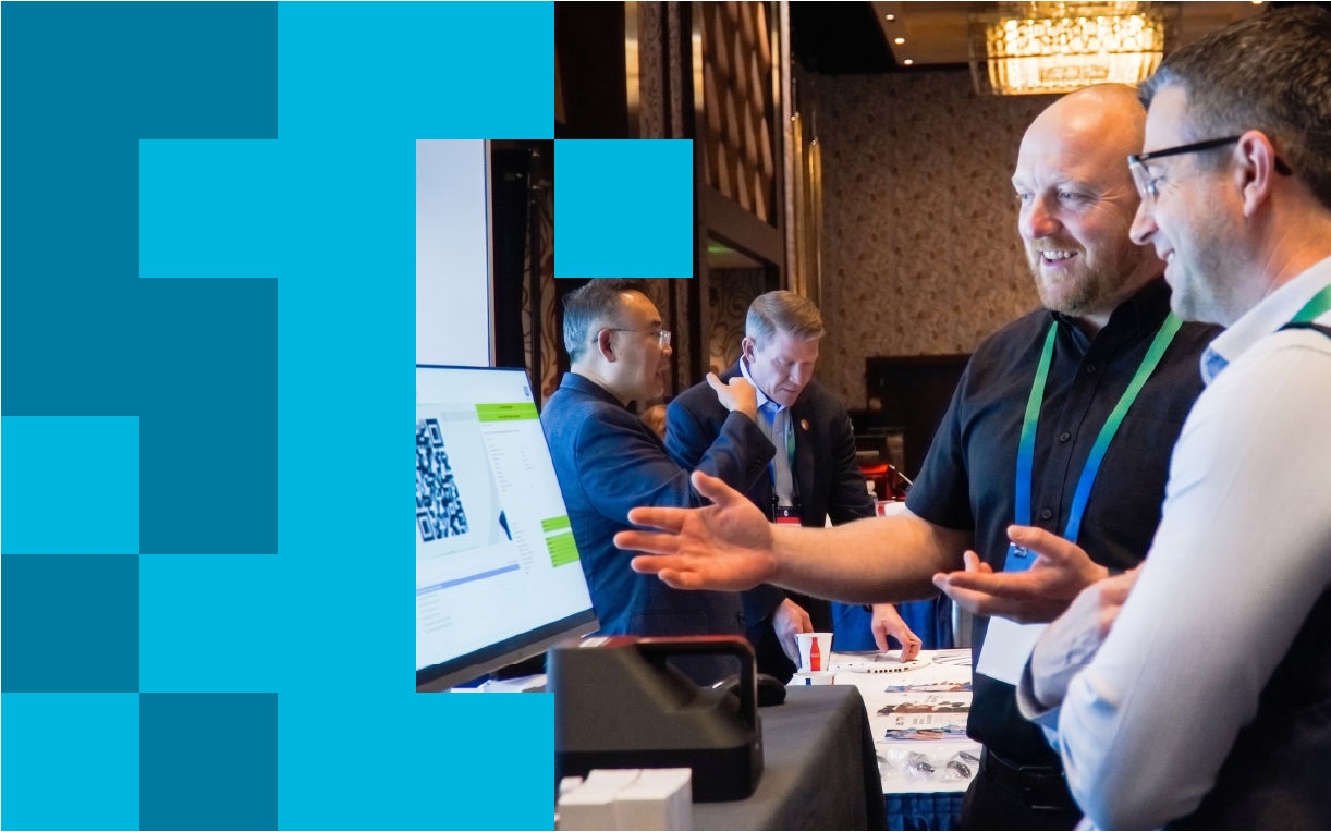 Conference attendees engaging with demo