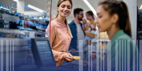 Consumer at grocery store checkout 