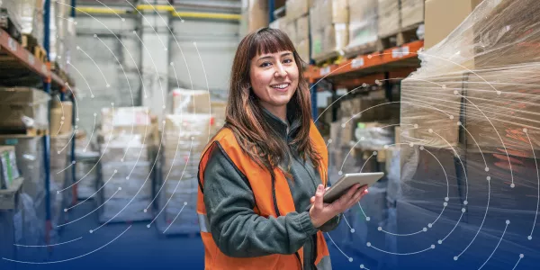 Woman scanning in warehouse