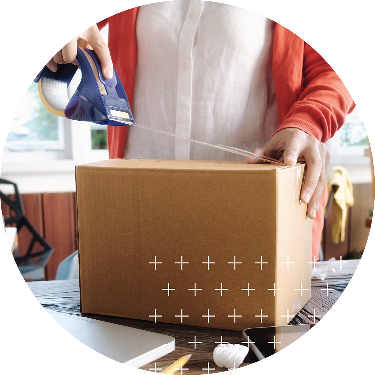 Small business owner packing box for shipping