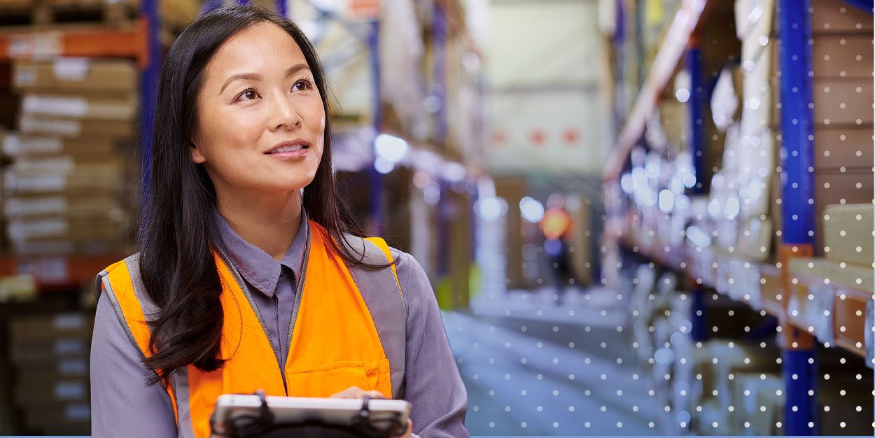 Warehouse worker with tablet