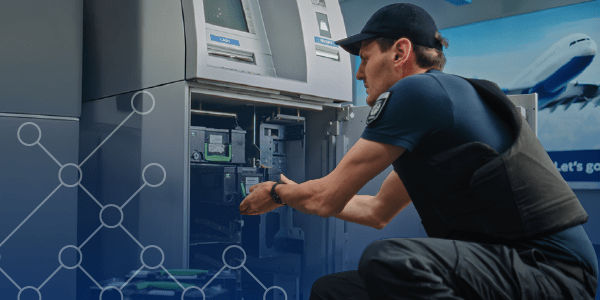 Man working on ATM