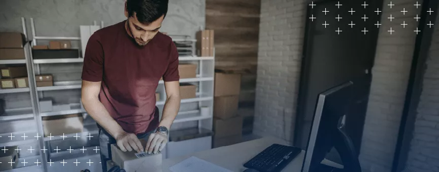 Small Business owner packaing product