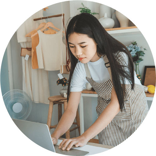 Woman typing at computer