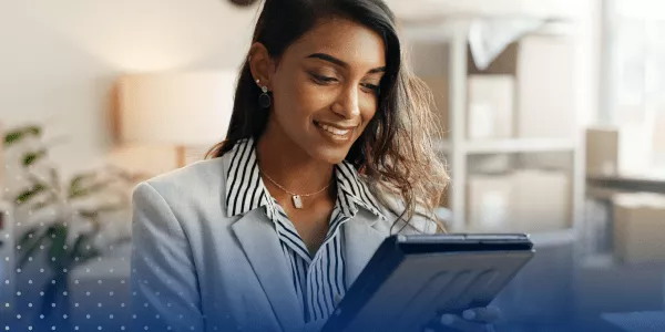 Business person looking at tablet