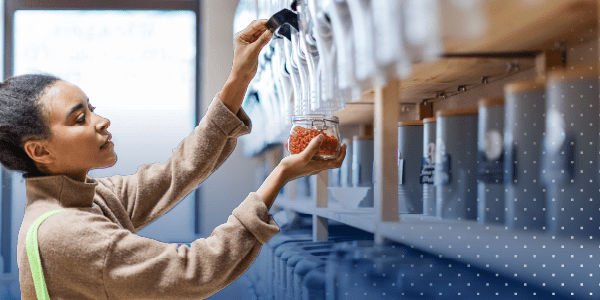 person dispensing product in a store into a dish