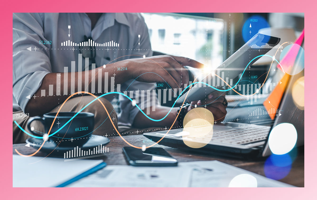 image of person working on laptop with data overlay