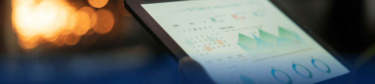 Picture of a tablet containing charts and data