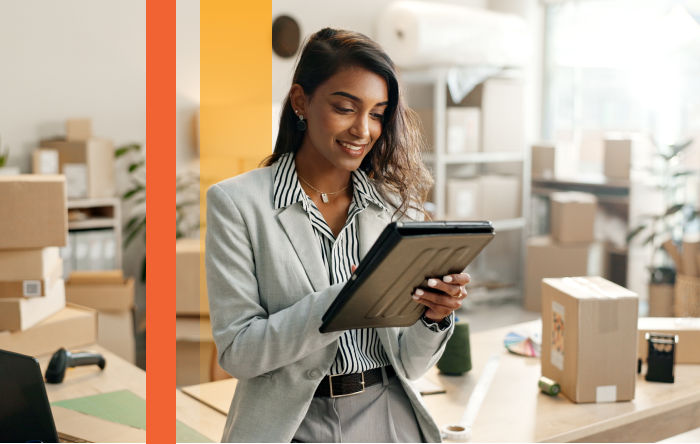 Business person on tablet managing product information