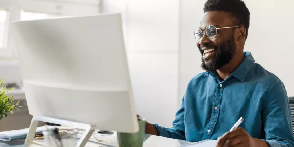 person at home taking an online instructor led course
