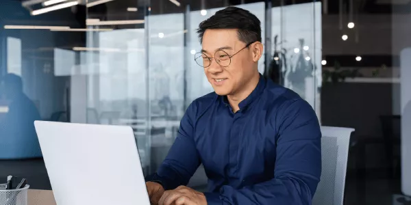Person in an office taking an online course