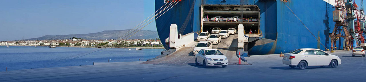 Exported cars coming off of a cargo ship