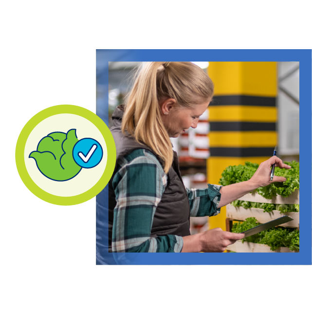 produce warehouse manager checking inventory