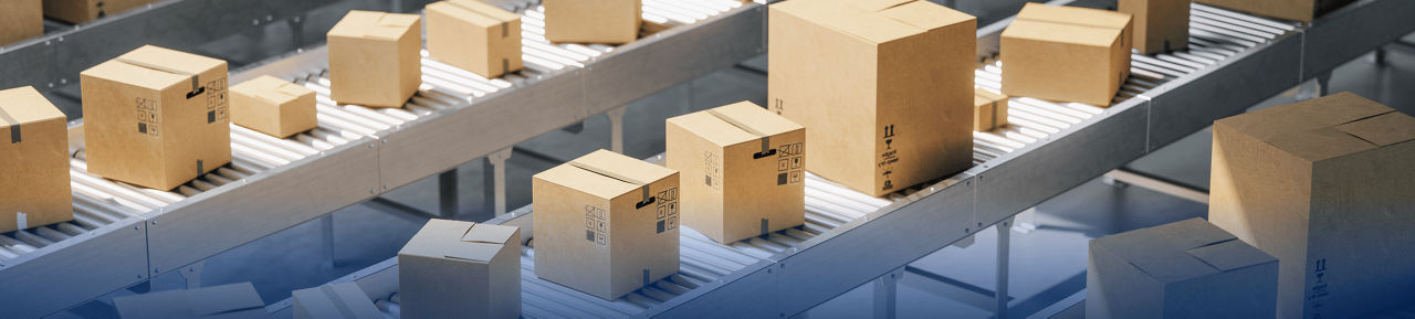 Picture of packages on conveyor belts in a warehouse