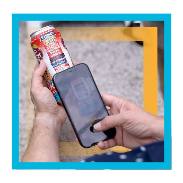 Person scanning product with phone