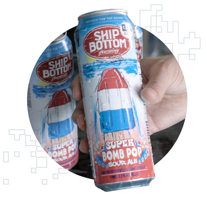 Hand holding Ship Bottom Super Bomb Pop