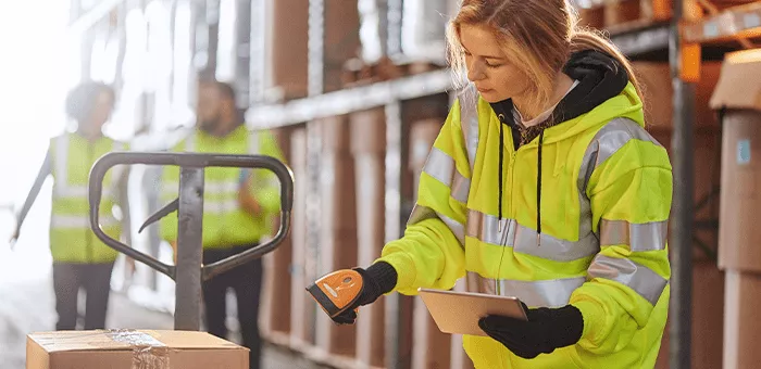 Warehouse worker checking box